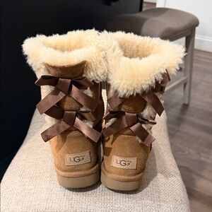 UGG Brown and Cream Sheepskin Boots with Bows